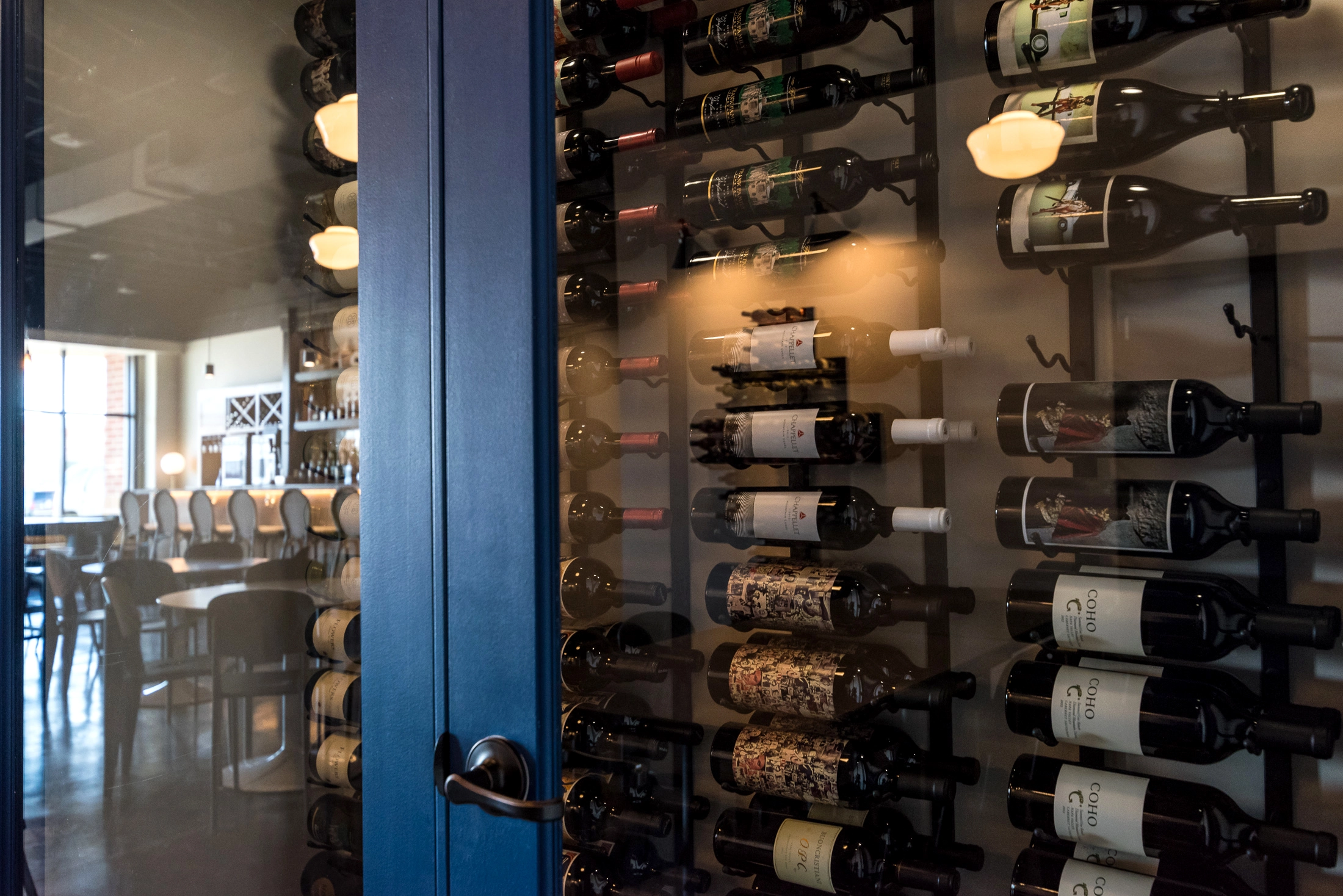 wine-in-grand-forks-elys-ivy Wine rack at Helix Wine and Bites in Grand Forks.