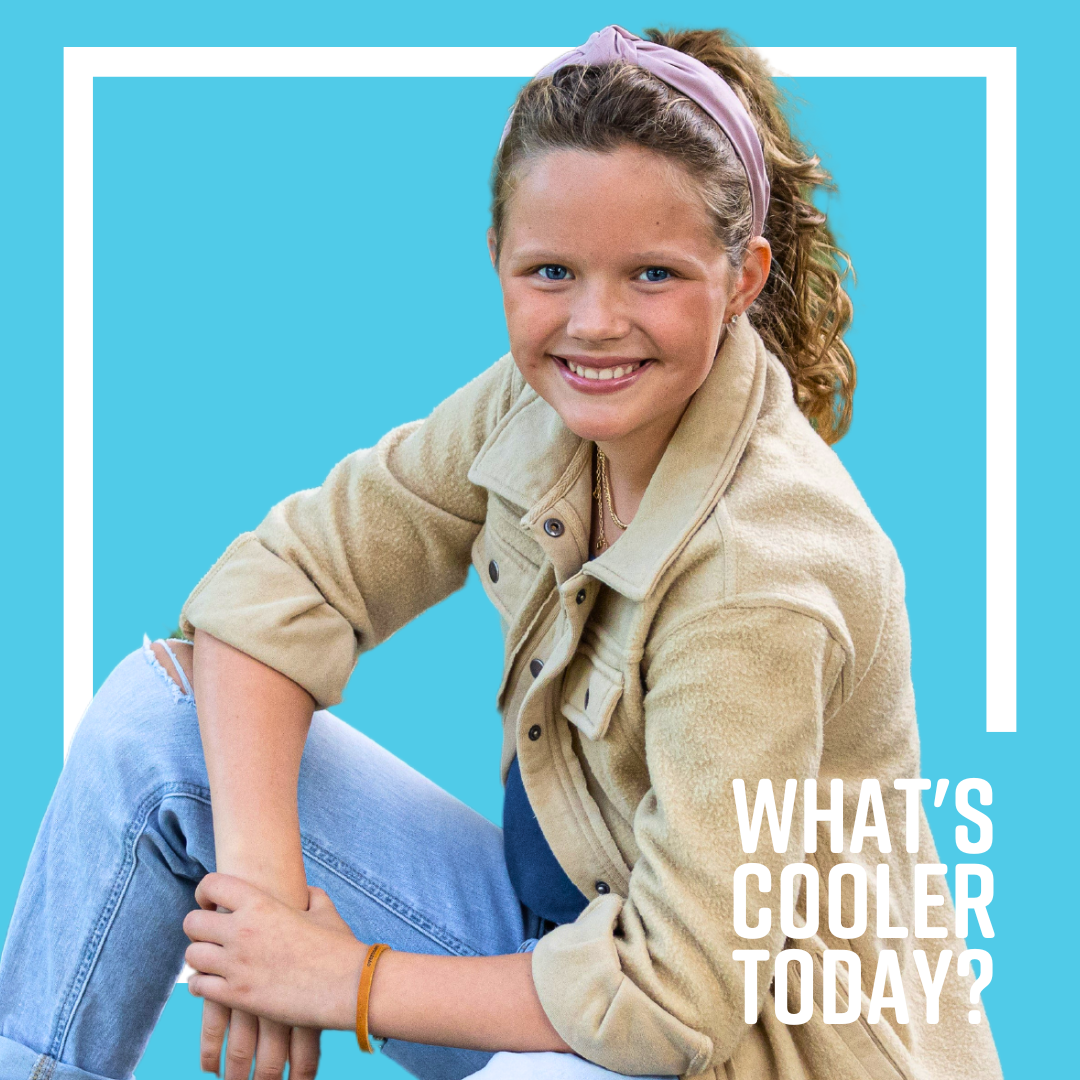 Brae Cooler Headshot (1) What's Cooler Today author Brae sits in a casual pose. She is surrounded by a blue graphic that reads "What's Cooler Today?"
