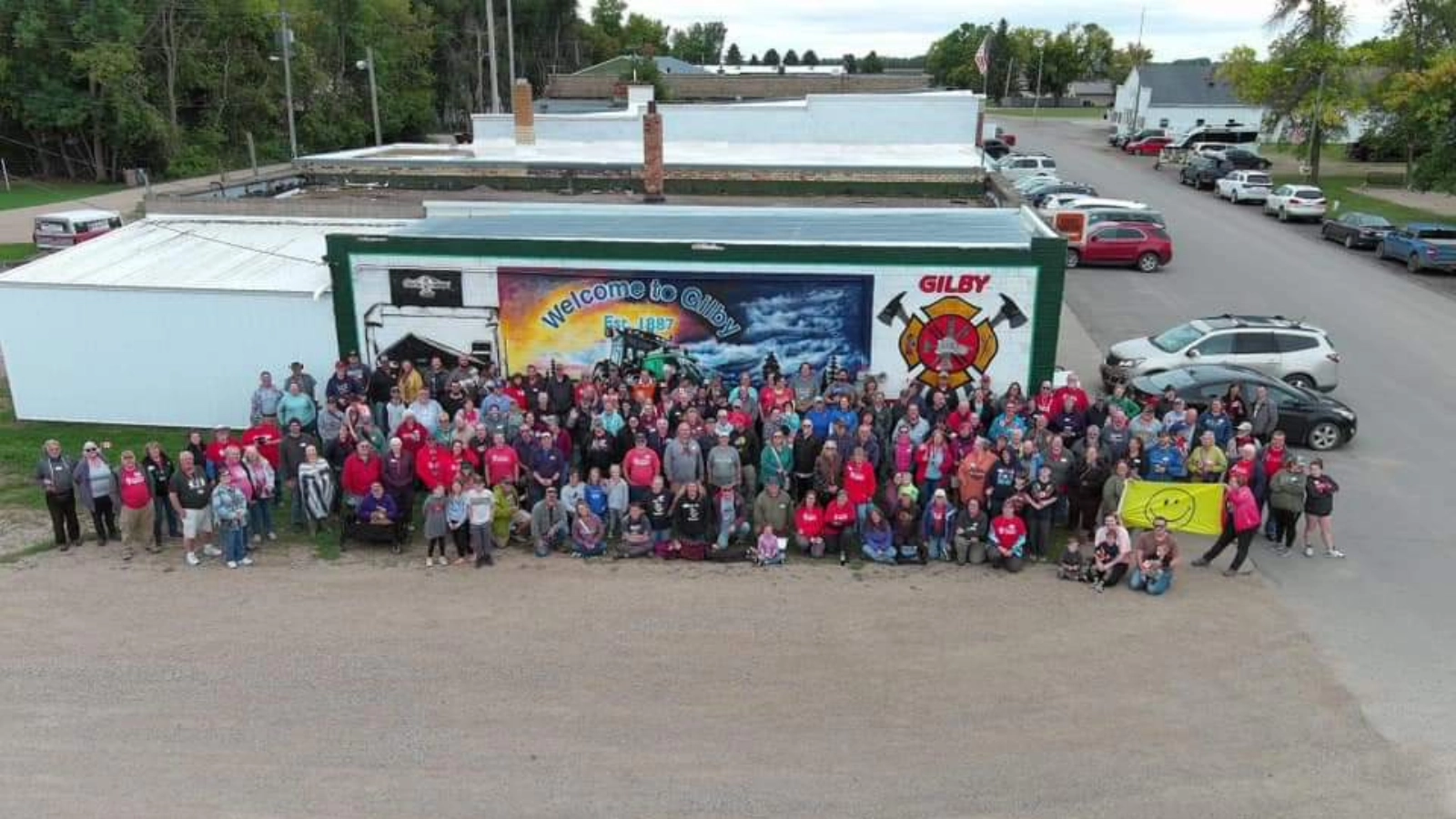 Geocaching-Grand-Forks-North-Dakota-Gilby-Welcome-Sign Crowd gathers in Gilby for Geocaching in the Greater Grand Forks region.