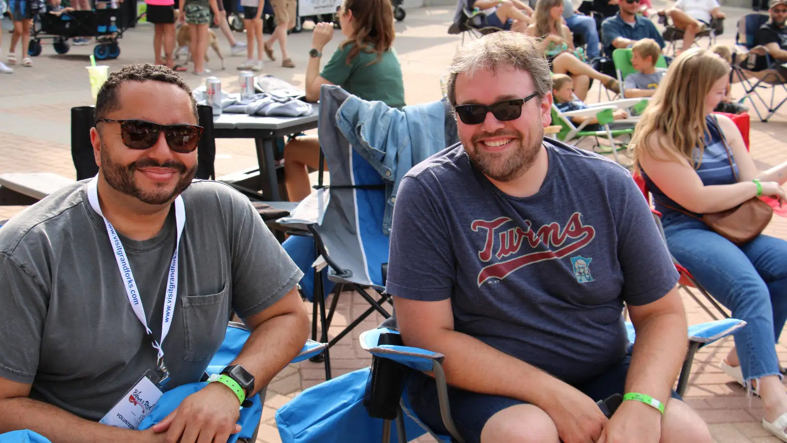 Ken-Town-Square-Grand-Forks "What's Cooler Today" author Ken sits in Town Square Grand Forks at Blues on Red concert