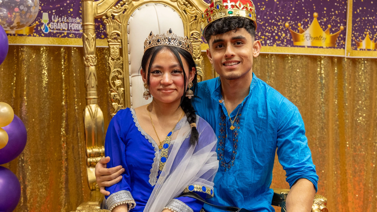 african-culture-night African culture night Royal Couple sits with crowns in Grand Forks.