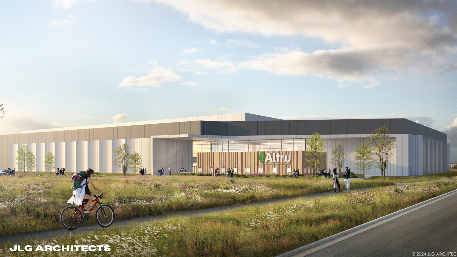 JLG Renderings of the new altru sports complex being built. It is set in a field surrounded by tall grasses and has tall windows surrounding the exterior.