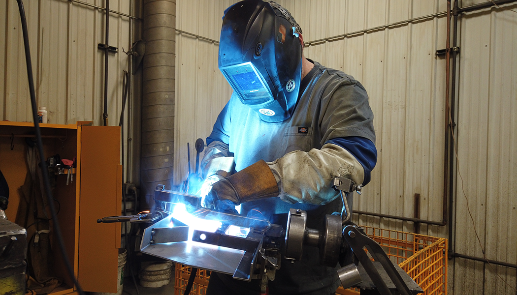 Paragon Pro Photo Manufacturing Jobs in Grand Forks North Dakota Employee works on building a computer highlighting manufacturing jobs in Grand Forks, ND