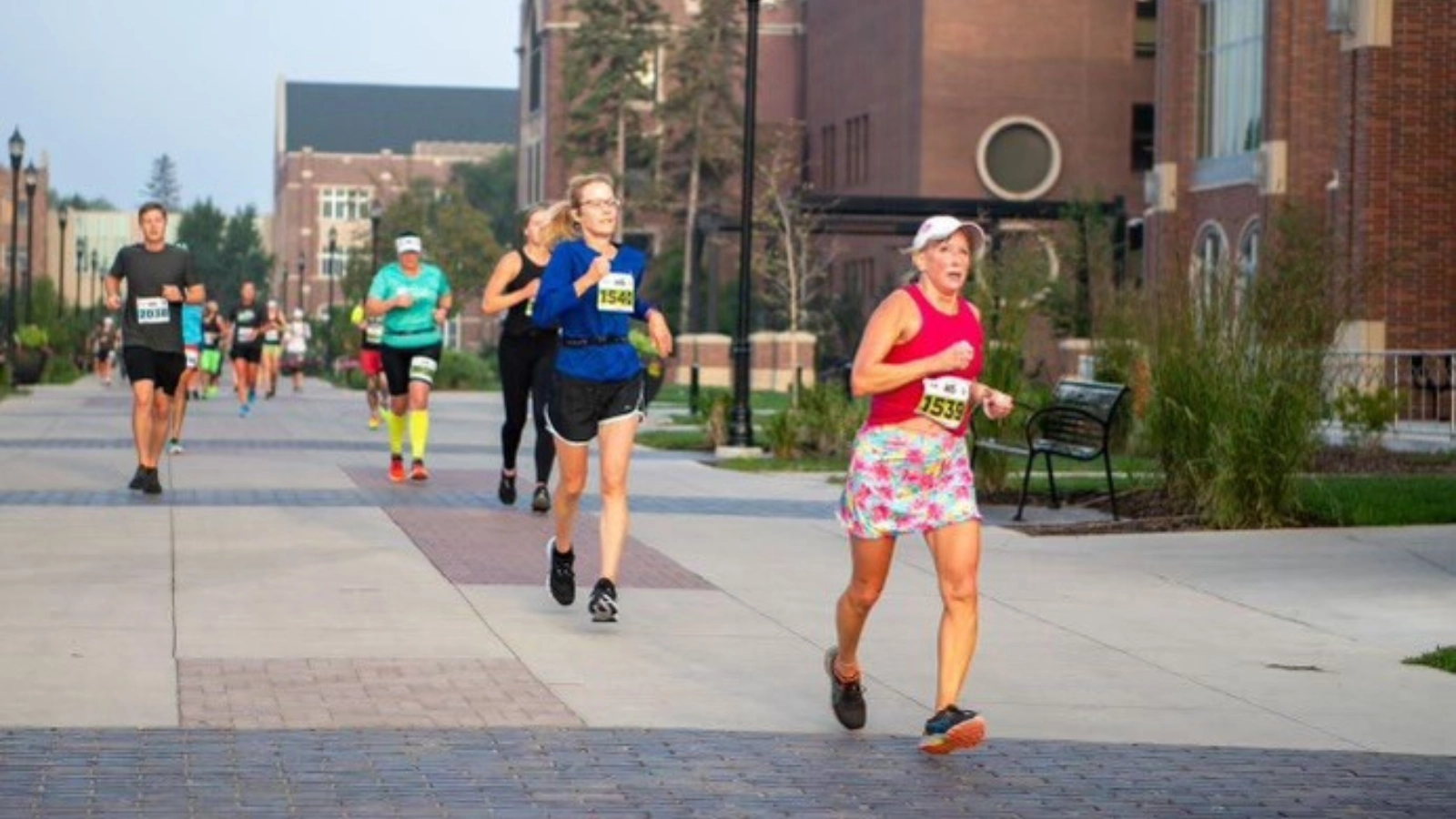 Runners on UND Campus runners race across the main paths on UND campus