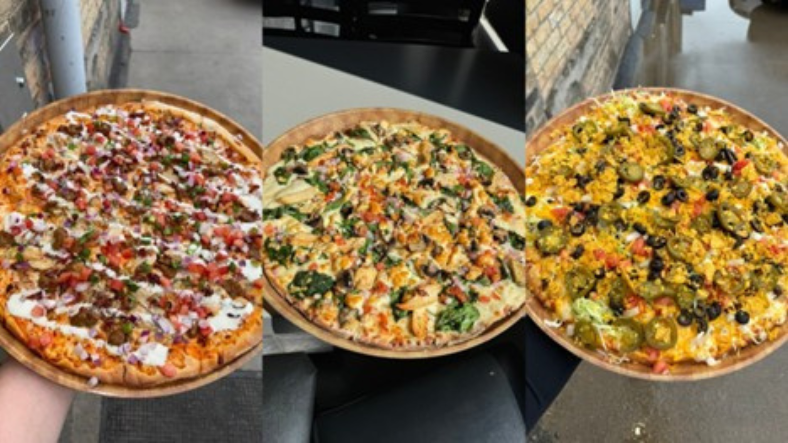 Joe Black's Pizza Joe Black's pizza display. Three different small size pizzas lined up next to each other for the camera.