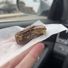 Pickles of Grand Forks Featured Image A close up of the inside of a chocolate covered pickle!
