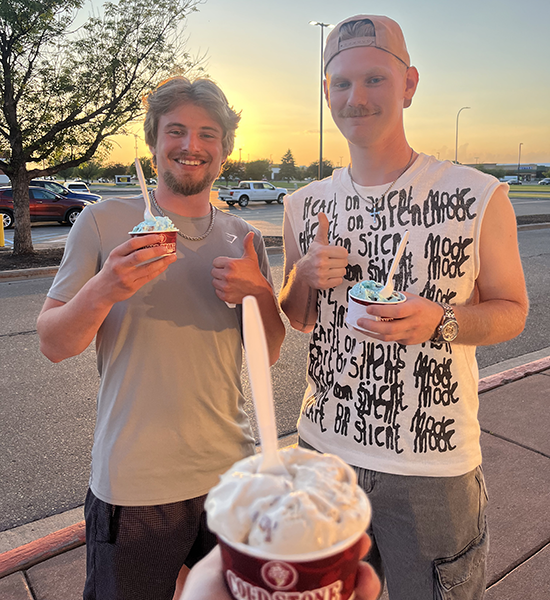 Two Grand Forksians smile at the camera with their ice cream from Coldstone
