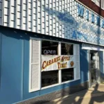 Widman's candy shop has their season caramel apples sign out front!